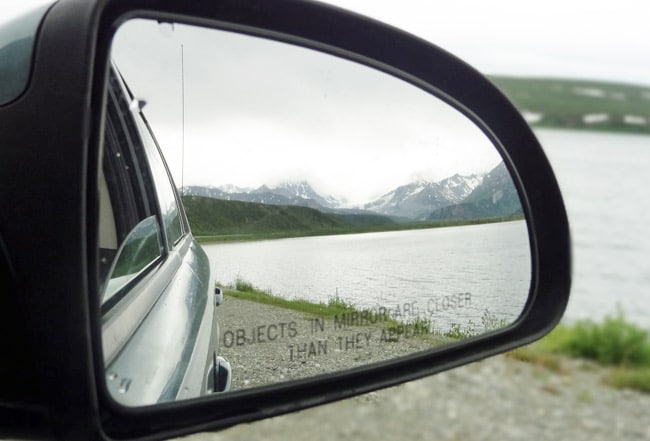 rearview mirror mountains traveling alaska 7 days
